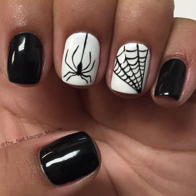 White and black Halloween nails