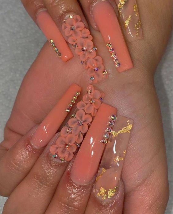orange nails with design
