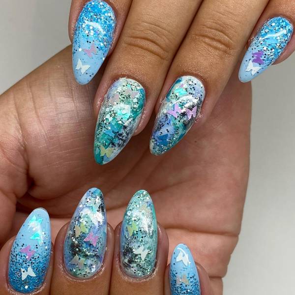 Oval Shaped Butterfly Summer Blue nails design