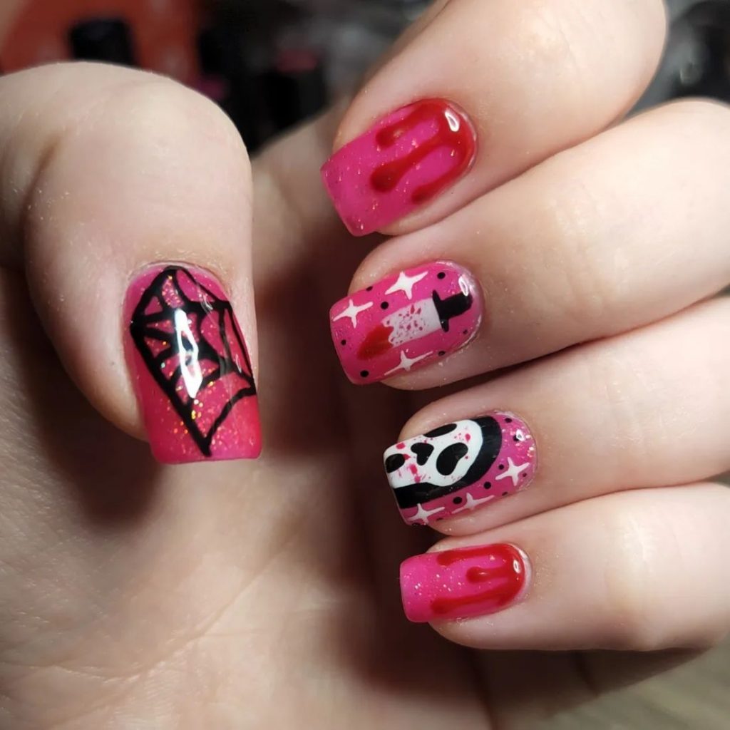 Scary Movie Pink and Black Halloween nails ideas