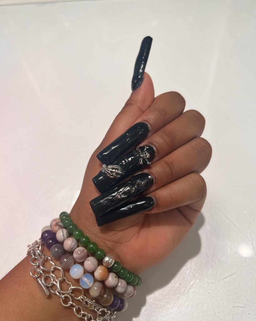 Long Black Nails with skull design ideas