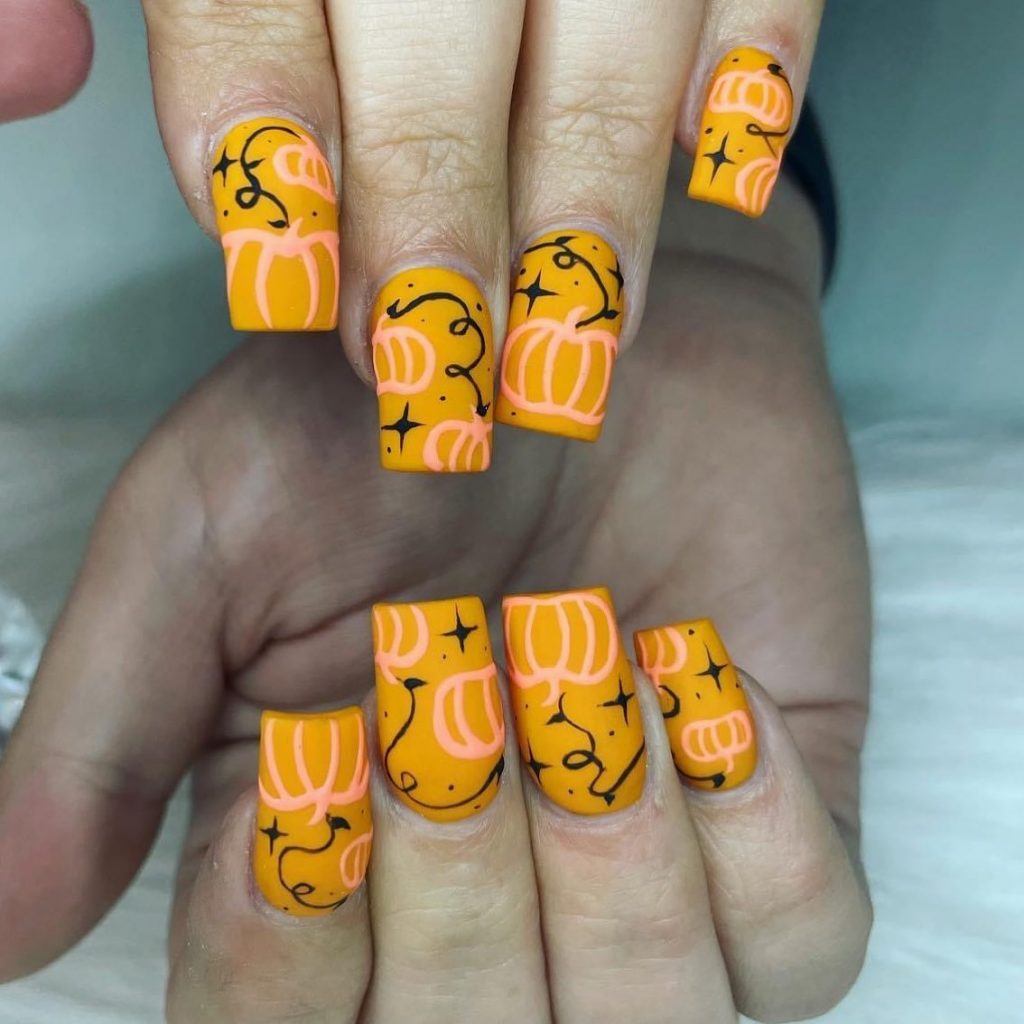 Long orange Halloween Pumpkin Nails design ideas