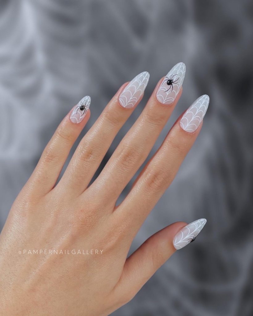 White Spider web with black spider creepy Halloween nails