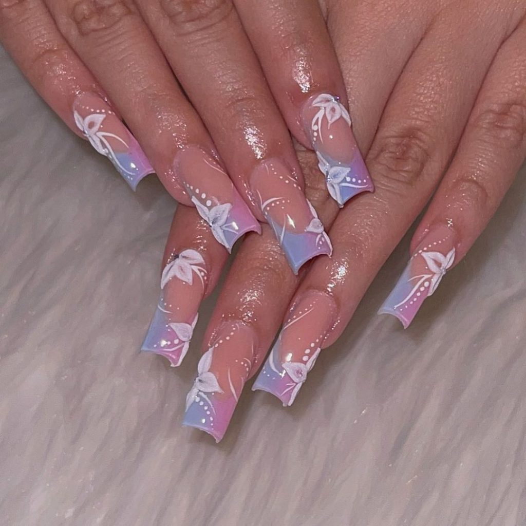 Ombre Purple and Pink Swag Nails with White Floral Design