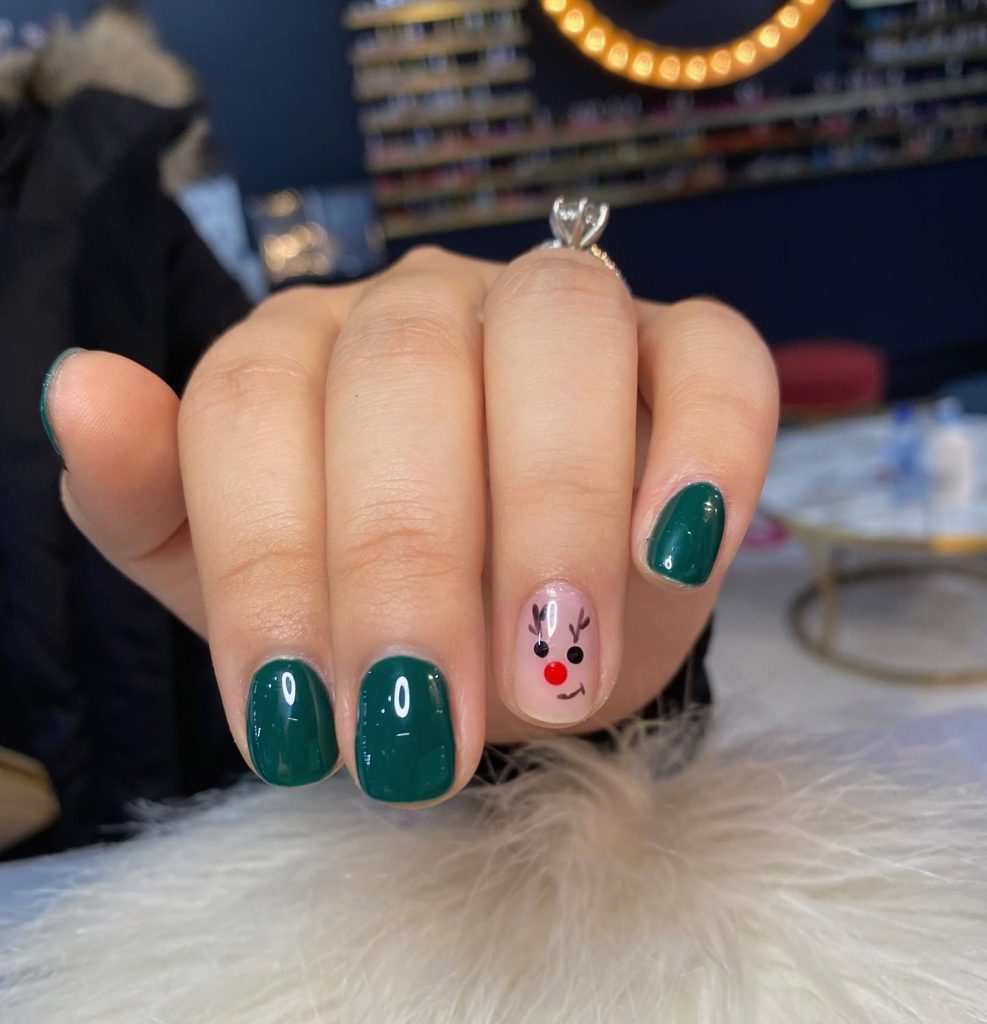 Short green and pink cute reindeer design nails ideas for the holidays