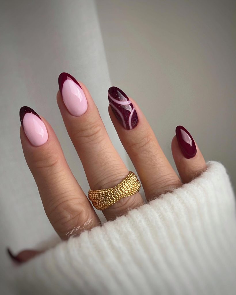 Oval french tip nails burgundy is cute with swirl patterns