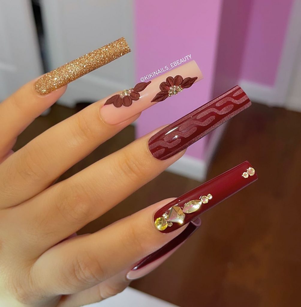 Long Burgundy Gold Nails with Flowers Design Ideas