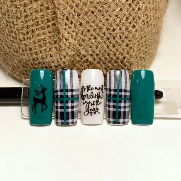 Green and black Reindeer designed nails