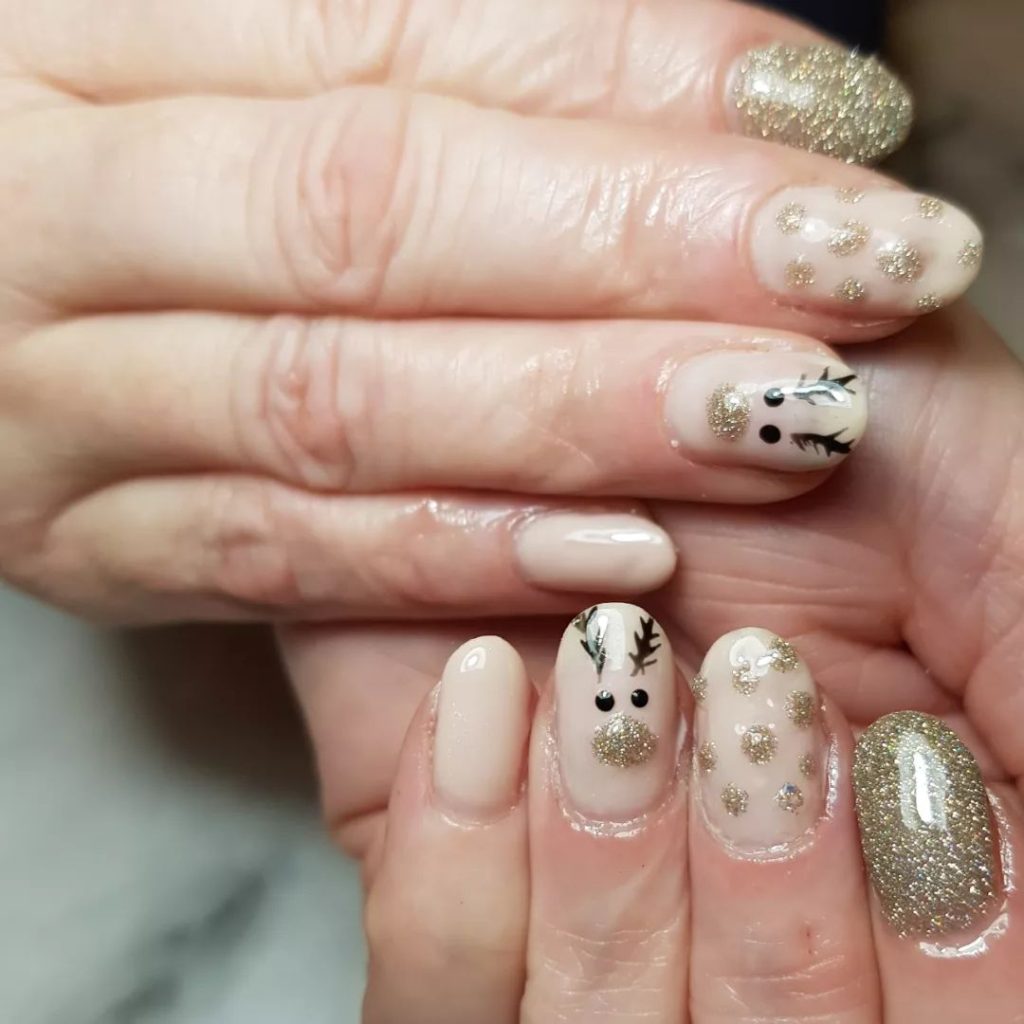 Christmas short gold glitter spotted cute reindeer holiday nails ideas