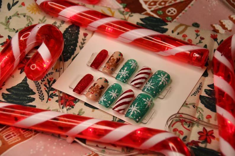 winter wrap green, red brown white and snowflakes Reindeer design Nails