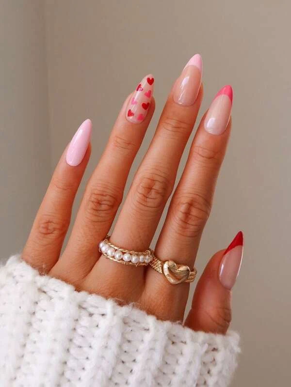 Light pink nails with a tinny heart design over french tip design nails ideas