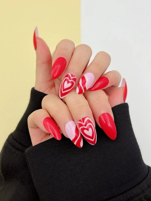 Swirl design red and pink heart oval-shaped nails