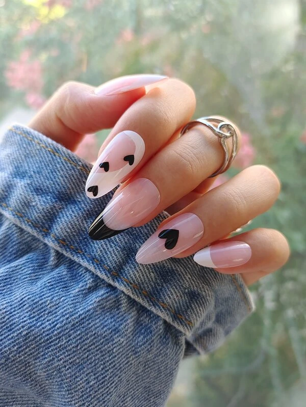 White and Black Nails with heart design and black tip Valentines nails