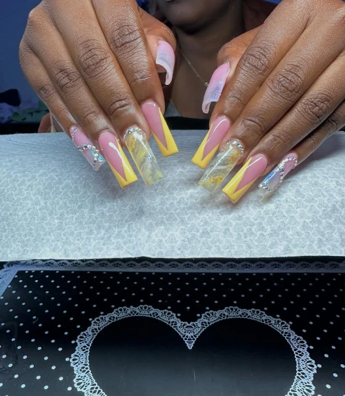 Yellow and pink French tip long nails