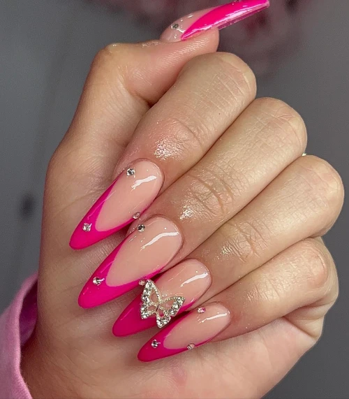 Long hot pink Rounded shape French tips nails with Diamond studs