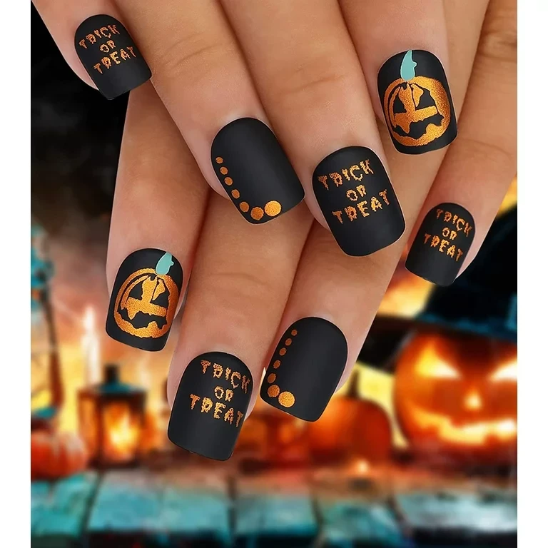 Matte Black short nails with gold-colored nail polish and pumpkin nails design 