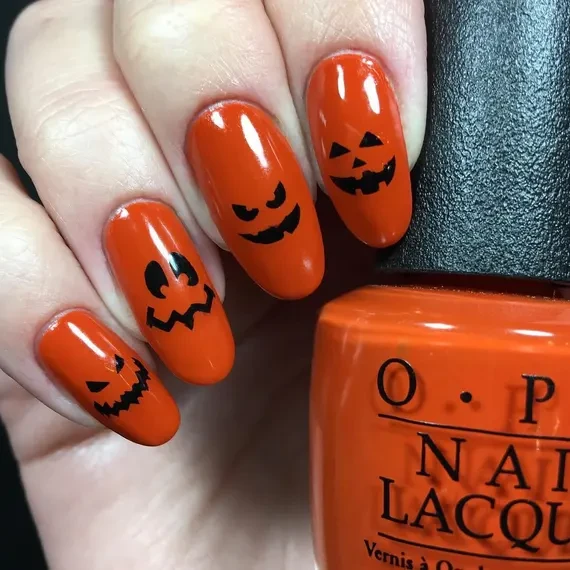 Pumpkin Jack Oval shape Orange Nails design