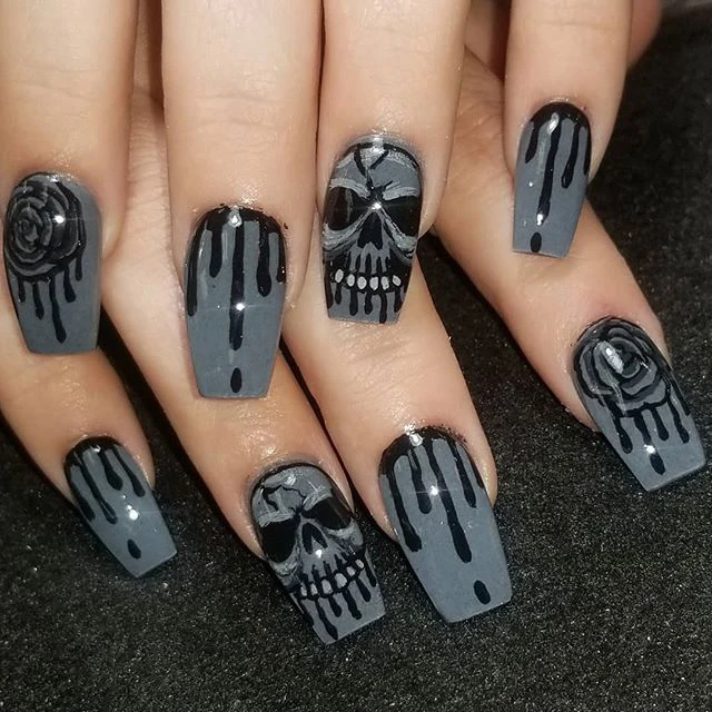 Gray and Black Human skull Nails