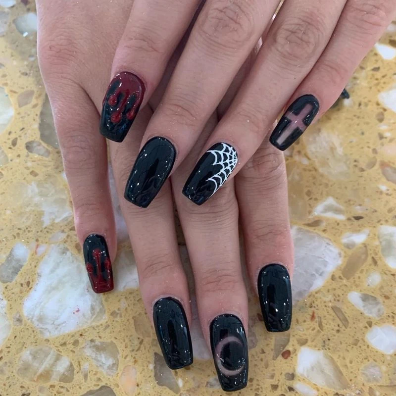 Blood moon spiderweb black and white with red design fake nails