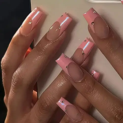 Pink French tip Coffin nails with rhinestones