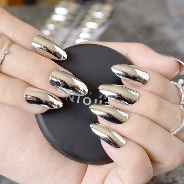 Foiled Fantasy: Metallic Accents for Short Oval Nails